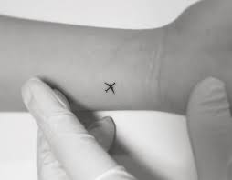 Make sure to pick the best designs for your wrist tattoo. Tiny Tattoos For The Minimalist In You