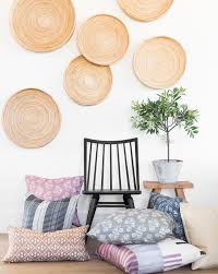 By heating the rattan, artisans are able to bend and swirl the normally stiff fiber into this wonderfully expressive circular design. Cane Rattan Round Tray Earthy Home Decor Home Decor Target Home Decor