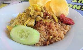 Bagi masyarakat kelantan, hidangan ini digelar nasi tupe. Nasi Minyak Wikiwand