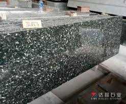Peacock green granite is a deep green with gold flecks and is available in polished slabs. New Emerald Pearl Granite Green Color Granite Small Slabs