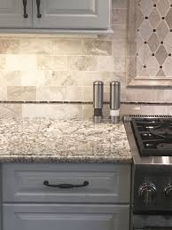 Backsplash Queen Beige Marble Subway Tile With White Zanzibar Granite Counter Kitchen Backsplash Designs Marble Countertops Kitchen Beige Backsplash