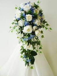 Forget Me Not And Casablanca Lily Google Search Cascading Wedding Bouquets Flower Bouquet Wedding Wedding Flower Arrangements