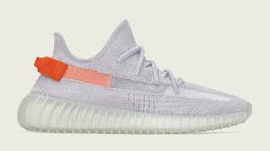 The entire upper is grey but the pull loop is orange. The Line Up Of Yeezy Day 2021 Is Known Sneakerjagers