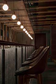 Chinese Studio Neri Amp Hu Has Designed A Long Communal Table And Suspended Lighting That Cr Bar Design Restaurant Restaurant Interior Design Cafe Bar Interior