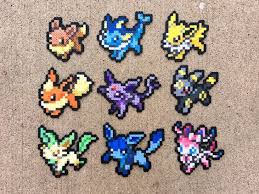 Eeveelutions Eevee Vaporeon Jolteon Flareon Umbreon Etsy Pokemon Bead Perler Bead Art Perler Beads Designs