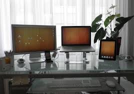 Macbook Pro 15 8243 Atop A Griffin Elevator Laptop Stand Hooked Up To An External 20 8243 Apple Cinema Display And An Ipa Mac Setup Ipad Charger Desk Setup