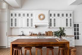 Trendy interior design with interior design for living area with stylish home accessories on bright pink background. Free Photo Stylish Scandinavian Kitchen Interior Chairs And Table In Foreground Fridge Long Wooden Counter With Machines Utensils On Shelves Interiors Design Ideas Home And Coziness Concept