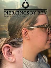 Body piercings for headache relief at 546 Tattoo Studio