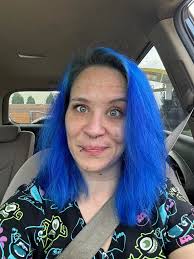 Woman shares her experience with blue hair and receives supportive comments