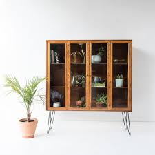 We take made in the u.s.a. Broyhill Curio Cabinet Atomic Furnishing Design
