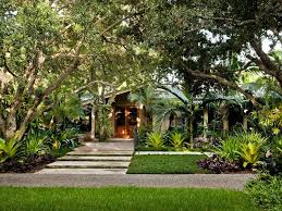 Upgrade Your Front Yard For Curb Appeal And More Tropical Garden Design Tropical Landscaping Tropical Landscape Design