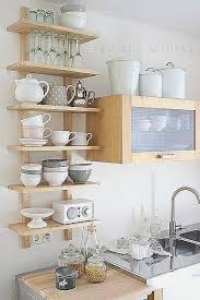 Kleine Kuche Mit Kochinsel 24 Elegante Kuchenlosungen Avec Kleine Kuche Mit Kochinsel Et 2 In Blau Kleine Kuche Einrichten Offene Kuchenregale Kuche Einrichten