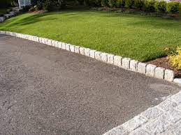 We buy in large quantities and own our own stone quarry so we at new england asphalt. Driveway Edging Jumbo Cobblestones Used As Driveway Edging Driveway Edging Paver Patio Front Yard Landscaping