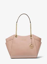 Sling bags, tote bags, wallets, clutches and bags of every style are all loved by women that serve different sort of purposes. Jet Set Large Saffiano Leather Shoulder Bag Michael Kors