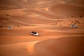 Dubai desert safari red dune: Dubai Red Dune Desert Safari With Bbq Sandboarding Camel Ride Travergy Travels
