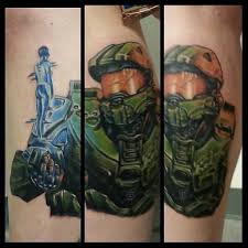 When tattoo is not only an art! Freaking Awesome Halo Tattoo Done By Mattie Macabre Tymeless Tattoo Syracuse Ny Halo Tattoo Michelle Smith Magazi Gamer Tattoos Halo Tattoo Gaming Tattoo