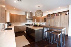 To balance out the use of dark cabinets and countertops, which look stunning, a light floor and ceiling were necessary to keep this. Dark Wood Floor Ideas Kitchen Savillefurniture