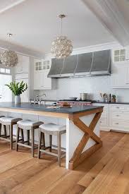 Natural capiz shells each framed in. Capiz Flower Chandeliers Over X Base Kitchen Island Transitional Kitchen