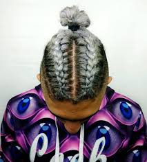We offer services such as precision haircutting, hair color, highlighting, perming, vegan smoothing treatments, braiding and hair extensions. Man Bun Braid Color And Style By Gigi Glamqueen Braided Man Bun Braided Bun Curly Hair Men