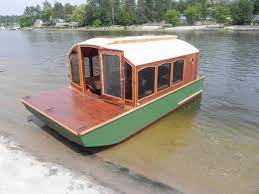 Man Designs Micro Houseboat You Can Build For Cheap House Boat Trailerable Houseboats Boat Building