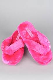 Pink homemade fluffy slippers with a heart isolated on a white background. Pink Betsy Fluffy Slippers Faux Fur Slippers Slippers Cute Slippers