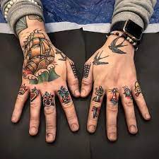 Traditional Apparel Co On Instagram What Finger Tattoo Would You Get Comment Below Credi Hand Tattoos For Guys Traditional Hand Tattoo Finger Tattoos