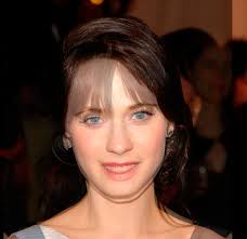 Zooey was dressed casually for her snap in a slim purple sweater. Zooey Deschanel Looks Kinda Bad Without Bangs Neogaf