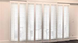 Sliding glass door blinds are made from a wide range of materials including natural woven fabrics and materials. The Best Window Treatments For Your Back Door Sunburst Shutters