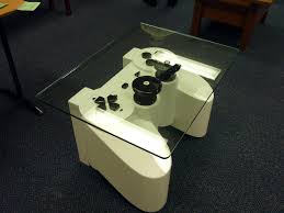 And this magic has materialized in the form of a fully functional nintendo controller coffee made from maple, mahogany and walnut by charles lushear of bohoworkbench.com, this table fully. A Coffee Table For Generation Y Made Of A Playstation Controller Science 2 0
