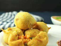 Mumbai Style Batata Vada Recipe Crispy Potato Fritters Recipe In 2020 Crispy Potatoes Indian Snack Recipes Potato Fritters