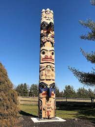 Totem poles are sculptures carved from large trees, such as the western red cedar. David Boxley Seattle Wa