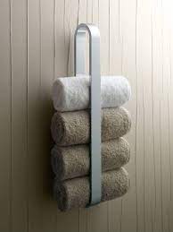 Bath towels range from about 27 inches by 52 inches in size all the way up to 30 inches by 58 inches for the largest towel. Small Bathroom Towel Rack Solution Bathroom Towel Storage Towel Rack Towel Storage