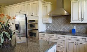Spot lights under the top cabinetry add movement to the area. Grey Granite Countertops For Kitchen Design Cafe