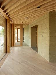 Mlzd S Lakeside Bird Watching Centre Features Rammed Earth Walls And An Aviary Rammed Earth Homes Rammed Earth Wall Rammed Earth