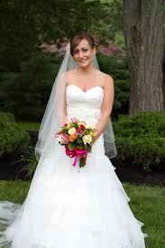 You can use as a dinner dress too. Bride In Strapless Ruffled Mermaid Wedding Dress With Cathedral Veil