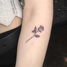 Tiny Flower Tattoo Ideas Popsugar Beauty Uk Tattoos Ribcage Tattoo Small Rose Tattoo
