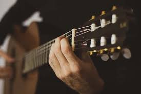 The original, general term for this stringed instrument is guitar, and the retronym 'acoustic guitar' distinguishes it from an electric guitar. Classical Vs Acoustic Guitar Making The Right Choice