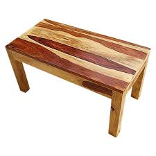 Rich textures embossed in lustrous leather border the surface of a lovely coffee table. Wausau Simplistic Handcrafted 100 Solid Wood Coffee Table