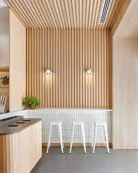 Wooden planks that usually form a lattice is a quite simple yet stylish interior element. Wood Slat Trend The Merrythought