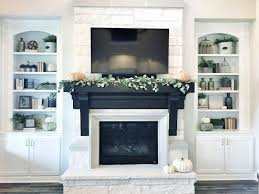 These sleek floating shelves boast a silky black finish for a bold look with easy coordination possibilities. 30 Tips To Diy And Decorate Your Fireplace Mantel Shelf