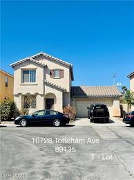 The sun is beginning to set on the woods near dorf. Summerlin Homes Las Vegas Real Estate