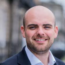 John Devine's Investing Profile