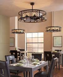 A ceiling fan can make a room more inviting and comfortable. The Unique Design Of The Brighton Court Ceiling Fan Is Classified As A Fandelier A D Dining Room Ceiling Fan Dining Room Ceiling Ceiling Fan Light Fixtures