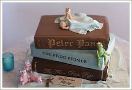 Hand carved book cake made for a young woman's graduation of her masters. Ideas For A Baby Shower A Baby S First Library Baby Shower