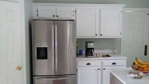 Spray painting the hinges is a cost effective option to replacing all the kitchen cabinet hinges. Hardware To Go With Brass Hinges Other Affordable Options Elizabeth Burns Design Raleigh Nc Interior Designer