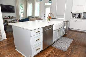 A galley kitchen is a long, narrow kitchen that has base cabinets, wall cabinets, counters, or other services located on one or both sides of a central walkway. What Is A Kitchen Island And Why You Need One Singer Kitchens