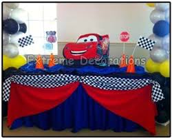 Once the wheels are covered with burlap rope, carefully stick round glass on top of it to make a beautiful table. Party Decorations Miami Disney Cars Balloon Party Centerpieces Cars Birthday Party Disney Kids Party Decorations Cars Birthday Parties