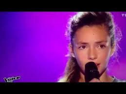 En 2014, à 7 ans, elle participe à la première édition de the voice kids, où son interprétation de la vie en rose d'édith piaf est saluée par les coachs. Video The Voice Kids Jeanne