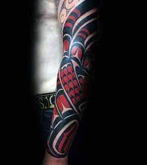 Nice red and black maori tattoo. 60 Red And Black Tattoos For Men Manly Design Ideas