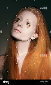 Les yeux rouges de larmes Photo Stock